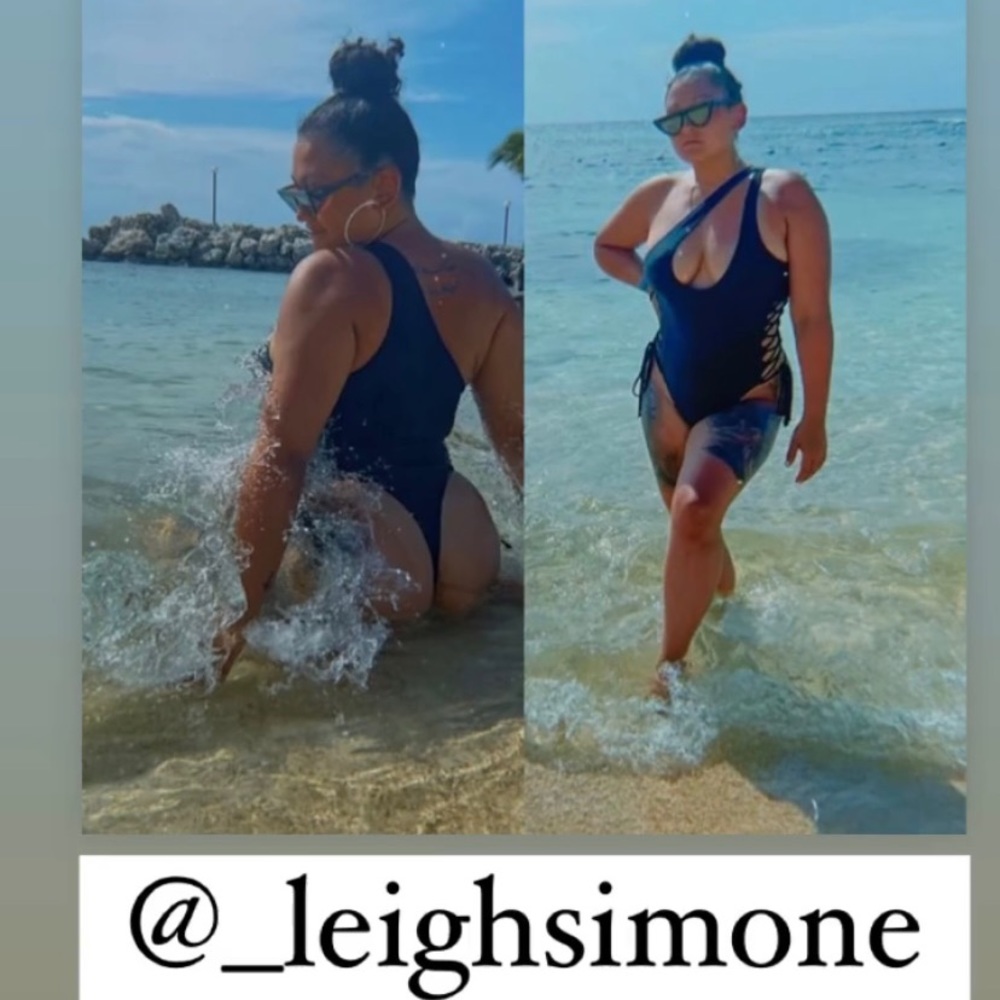 Black thong one piece swimsuit